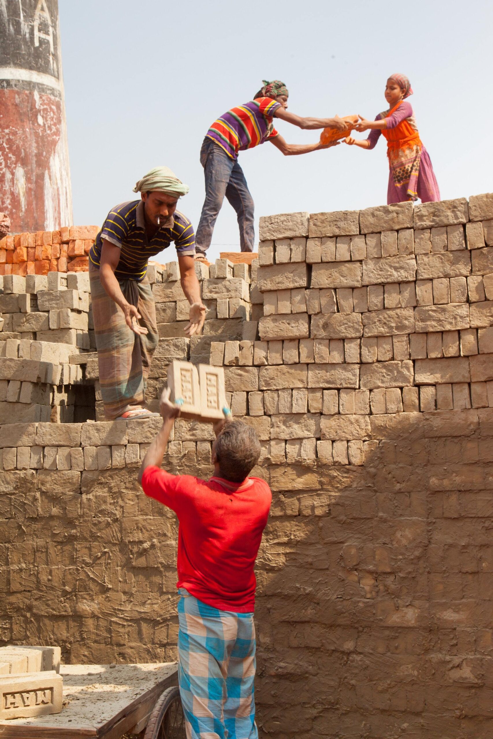 men with bricks